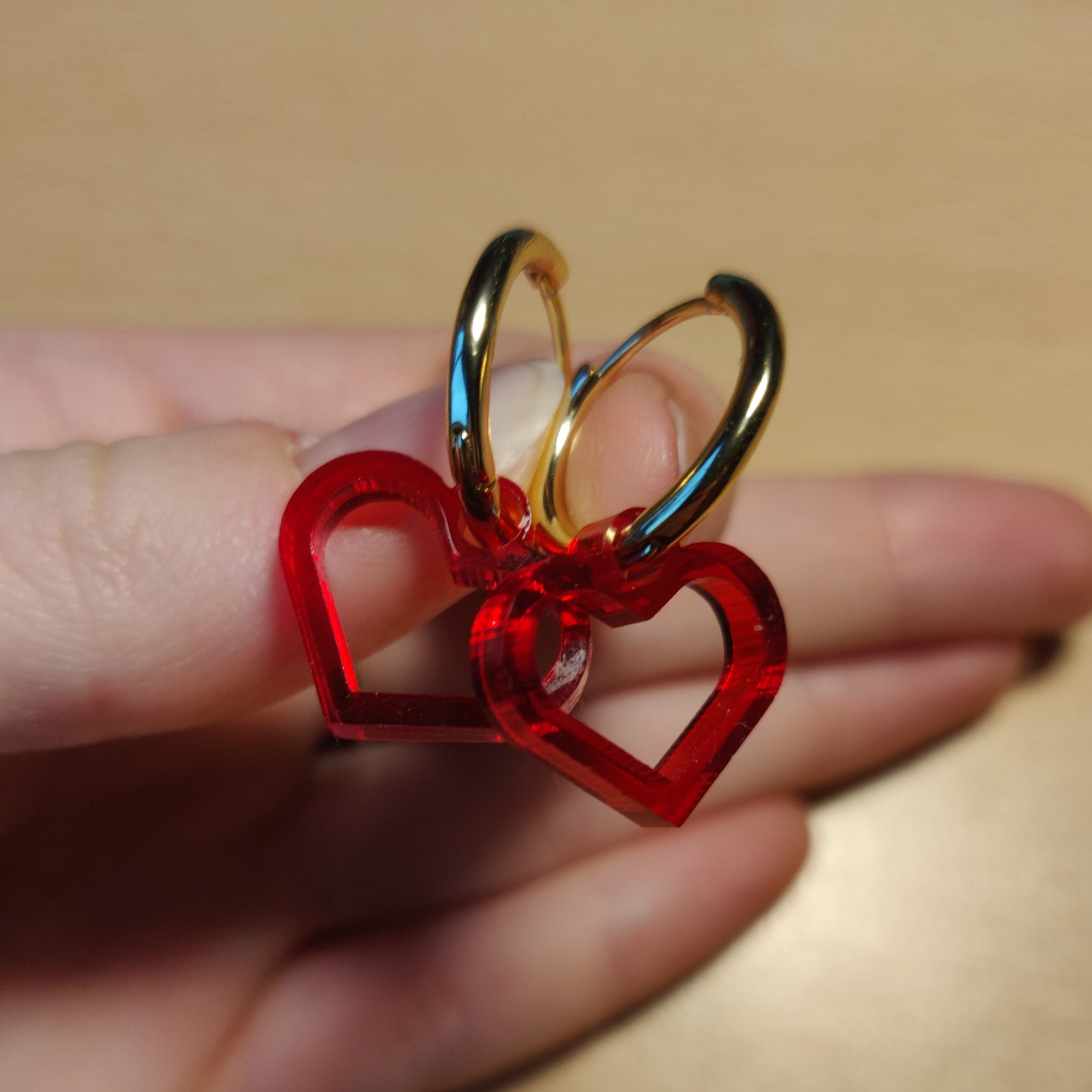 Red heart earrings created the same way